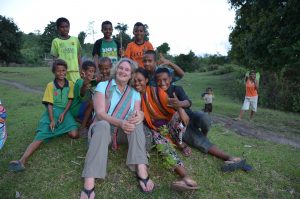 Barb Godfrey with children of Larimi Village